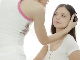Beauty lesbian helps her girlfriend to put makeup on her face